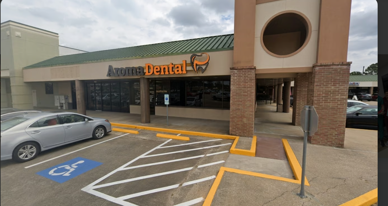 The Aroma Dental office storefront on FM 1960 Road East in Humble, TX